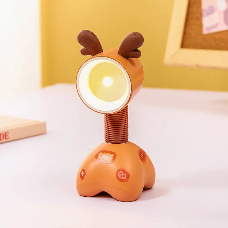 Cartoon animal magnetic night lamp with adjustable head on metallic surface