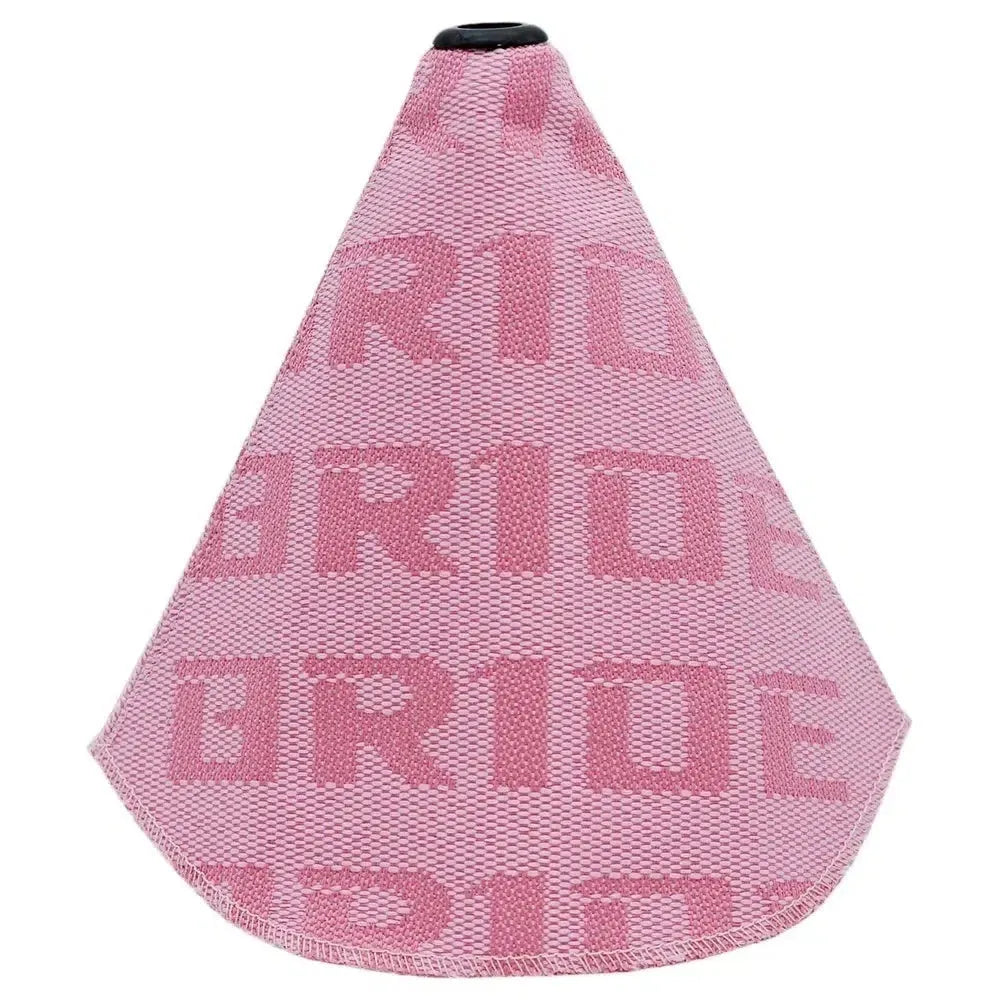 Canvas dust cover draped over a racing bucket seat in a vehicle interior.