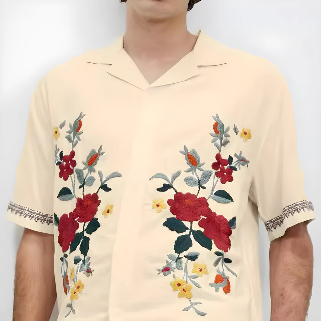 Apricot-coloured men's casual shirt with vintage floral print, short sleeves, and a cardigan-style lapel.