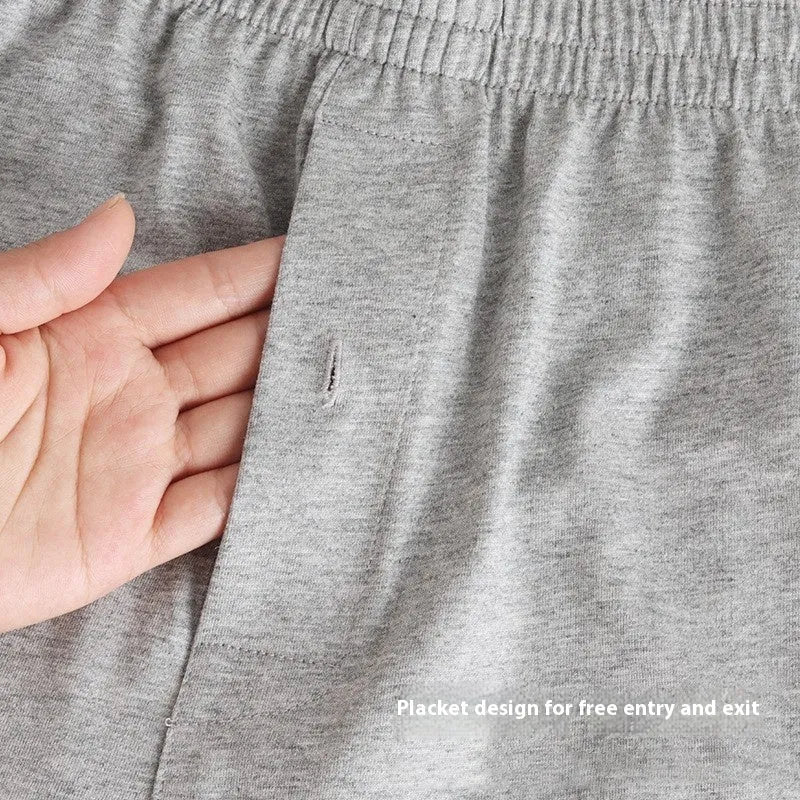 Men's light grey cotton boxer shorts with high waist and loose fit design