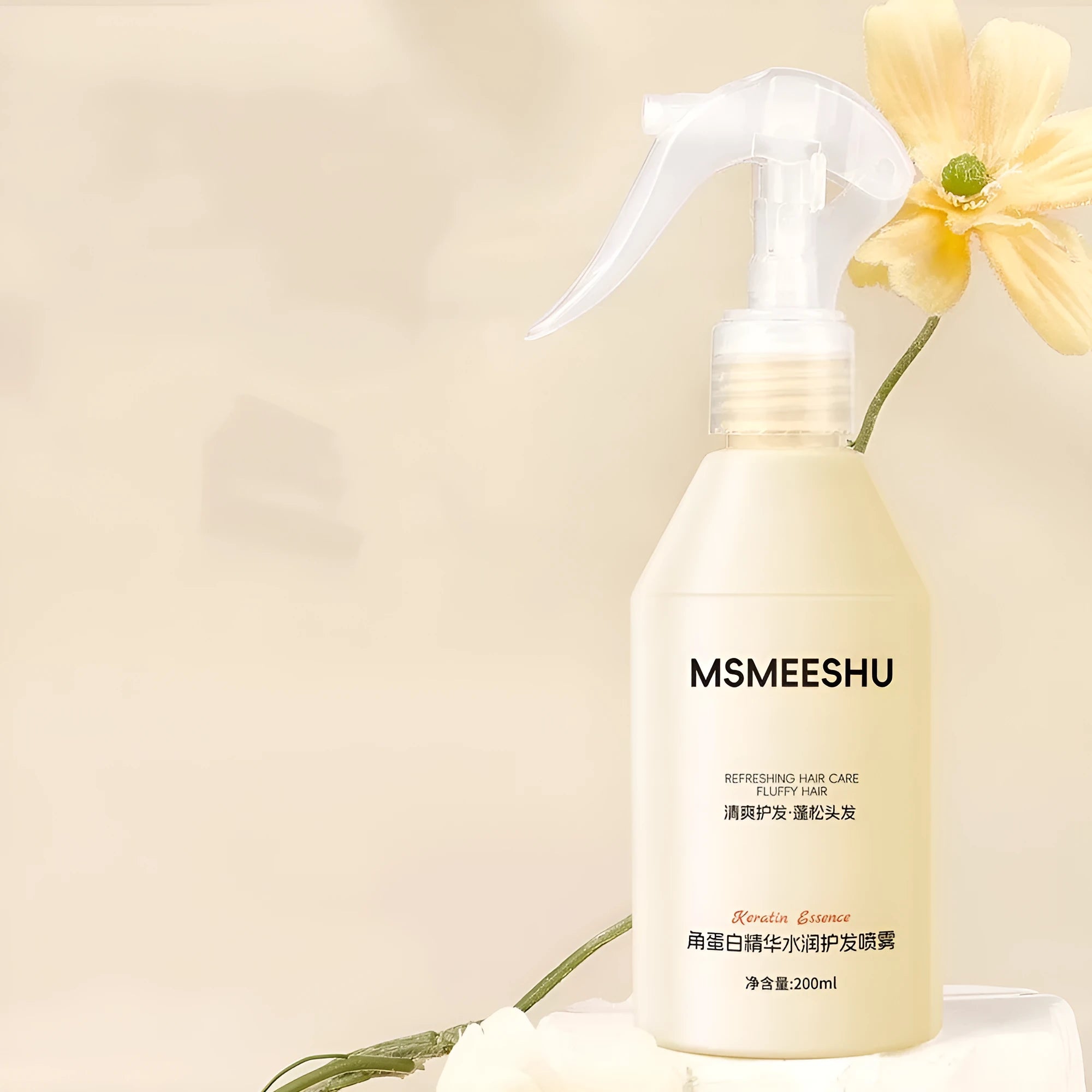 Honey Bundle Keratin Essence transparent hair care spray bottle showing soft and bright hair result