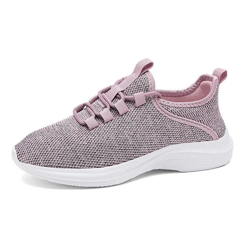 Women's low-top casual sneakers in black with flyknit mesh upper and lace-up front.