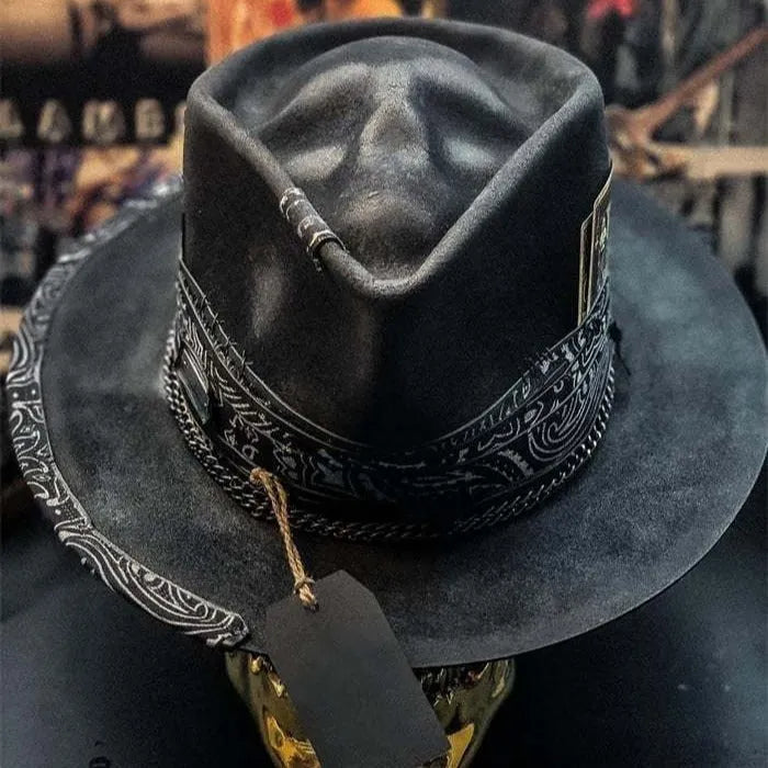 Handmade wool felt conical hat with skull design showing conical silhouette and wool texture