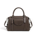Genuine leather ladies handbag in street trend style with contrast stitching and lock detail.