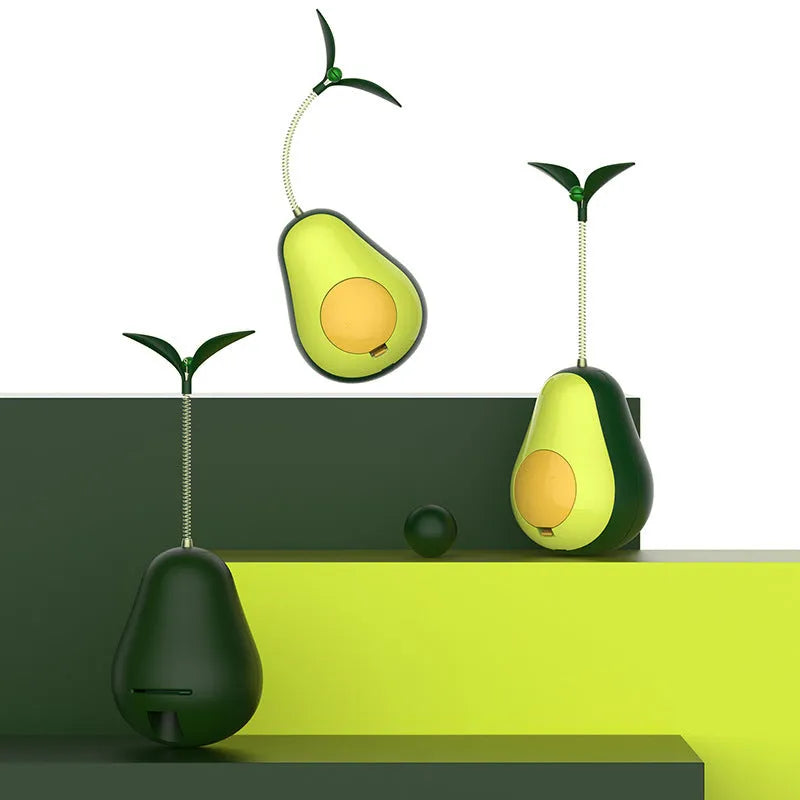 Green silicone avocado-shaped cat toy tumbler with treat dispensing opening, 80x80x107mm size