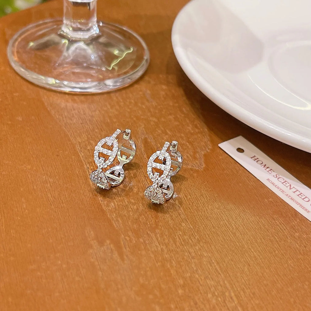 Electroplated copper diamond pattern earrings available in silver, gold, and rose gold thick plating