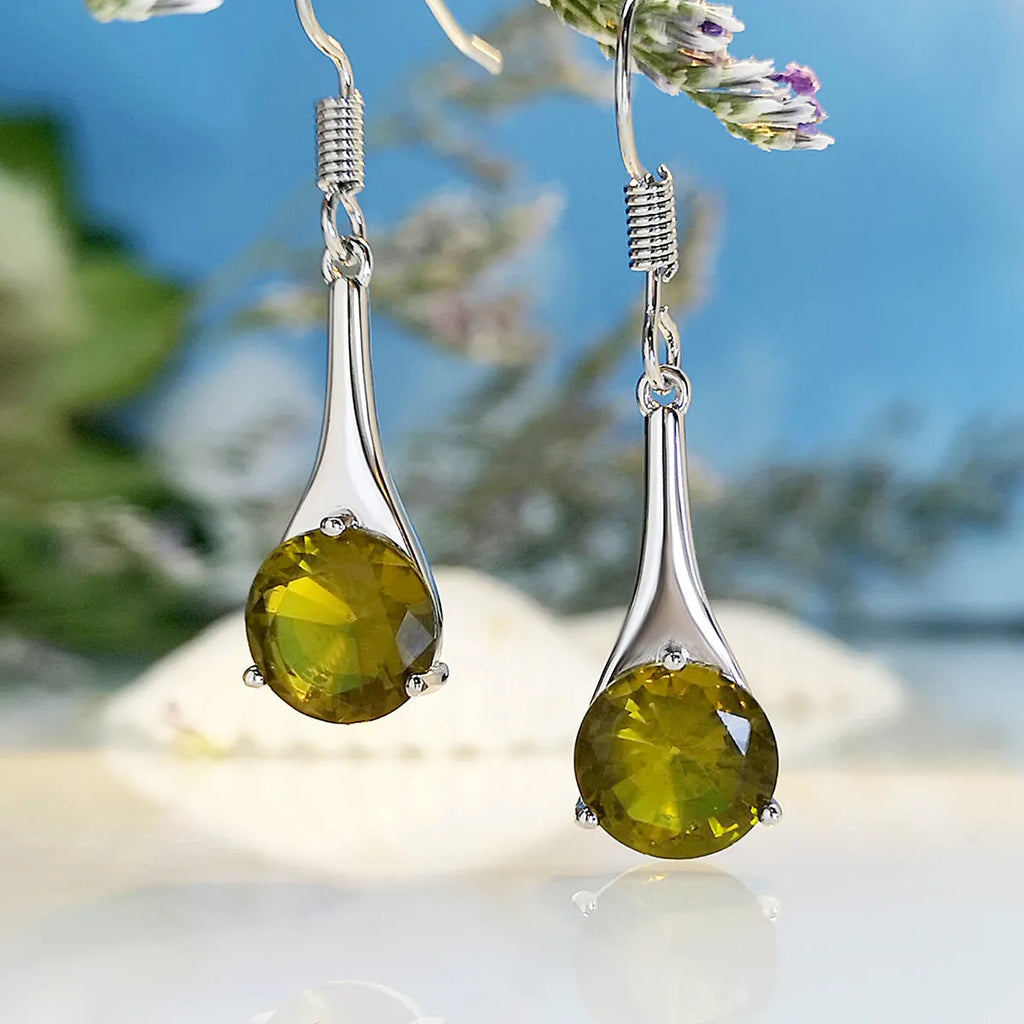 Olive green topaz earrings with water drop shape and retro style design