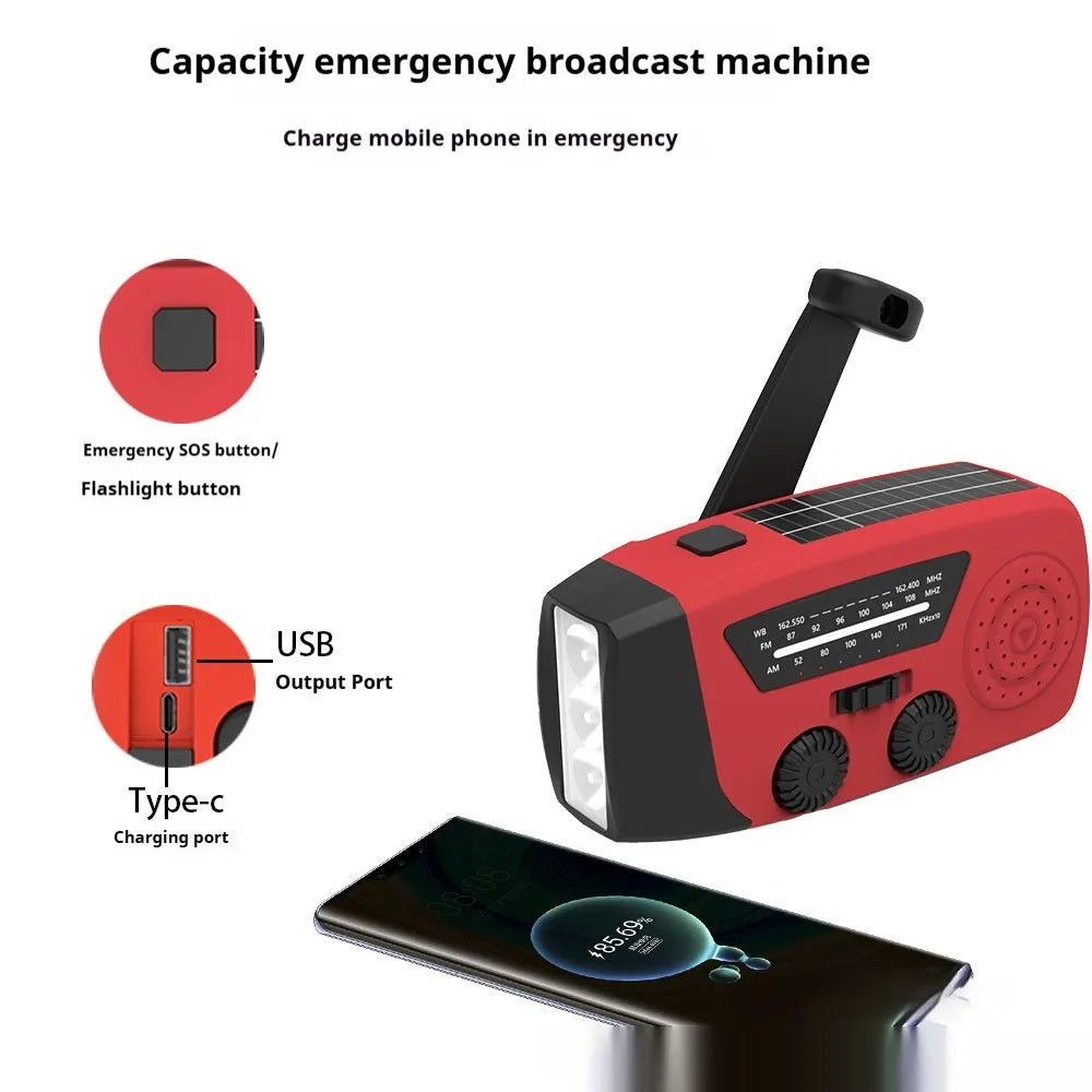 Red rechargeable hand torch with AM/FM radio, wrist strap, and USB charging interface
