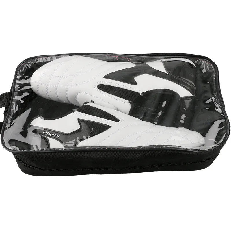 Black and white PU Taekwondo martial arts training shoes with a soft sole.