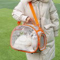 Hard-shell transparent cat carrier backpack in grass green colour, showing large space capsule design.