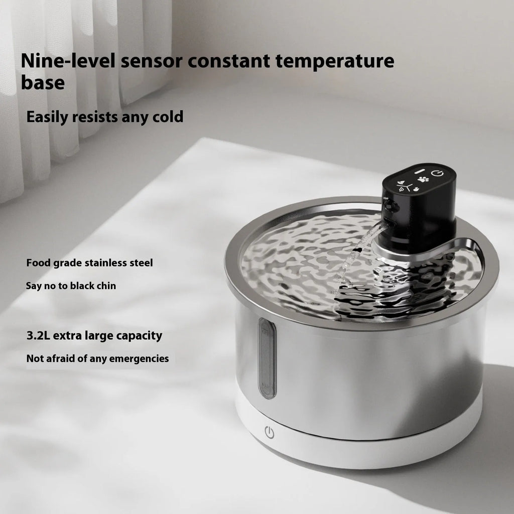 White heated pet water fountain for cats and dogs with stainless steel pump and temperature control base.