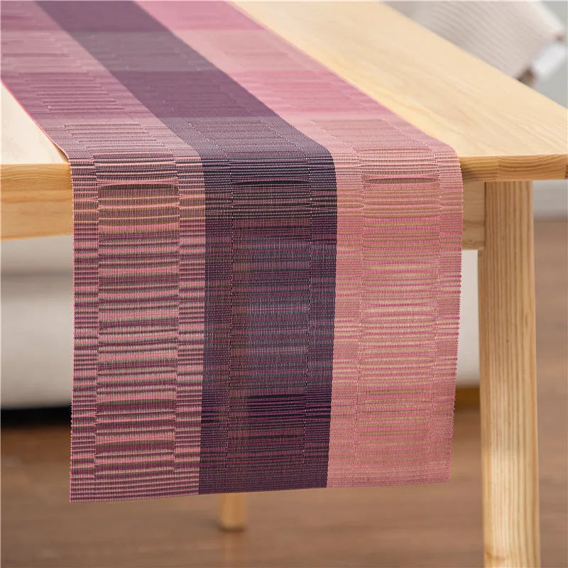 PVC non-slip dish mat in modern simple style on a dining table, showing gradient bamboo black colour option.