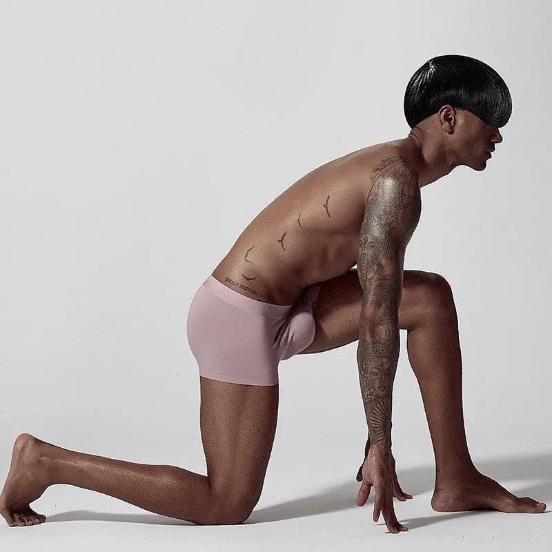 Seamless one-piece men's underwear in modal fabric showing mid waist design