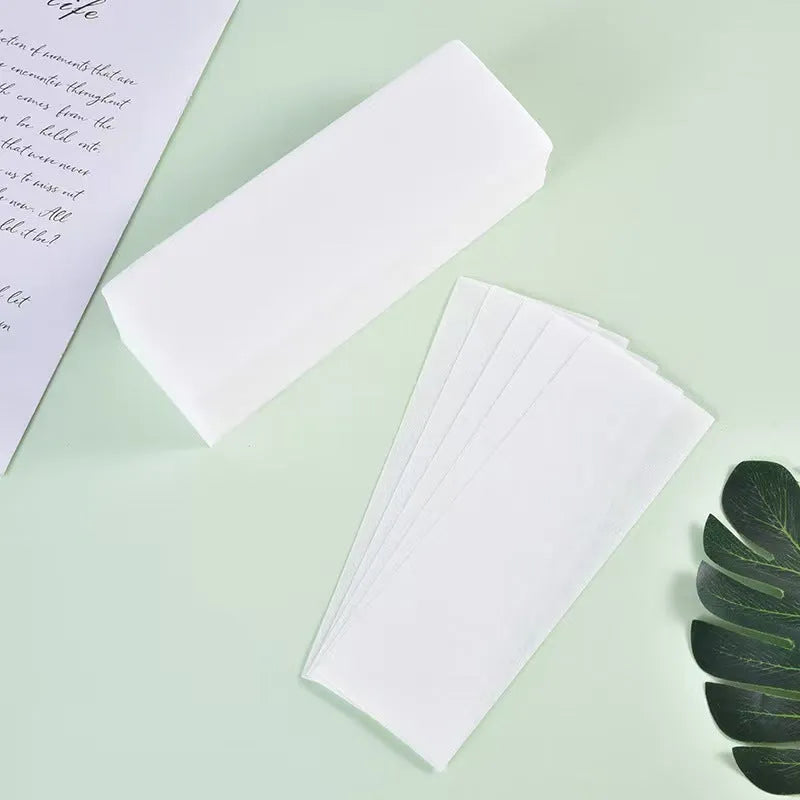 Non-woven fabric hair removal wax paper strips in 50 or 100 piece packaging