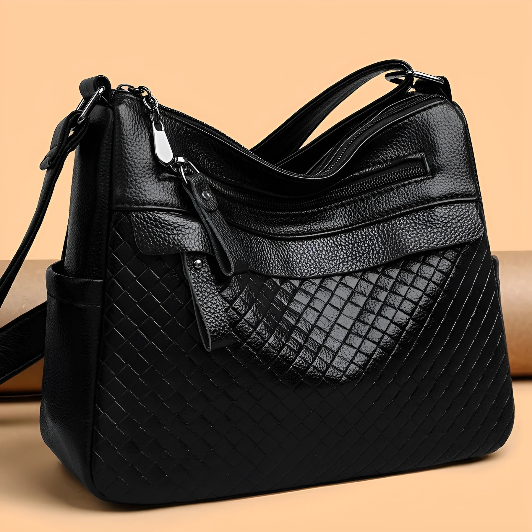 Women's soft PU leather crossbody bag in black with diamond pattern stitching, vertical rectangle shape 28x22x11cm