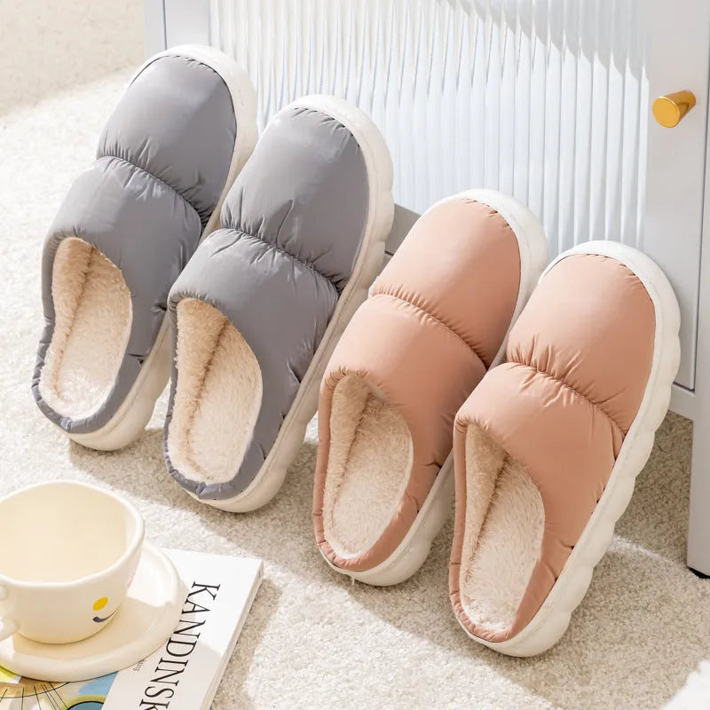 Down cotton winter slippers with artificial leather upper, thick rubber sole, and plush lining in blue colour