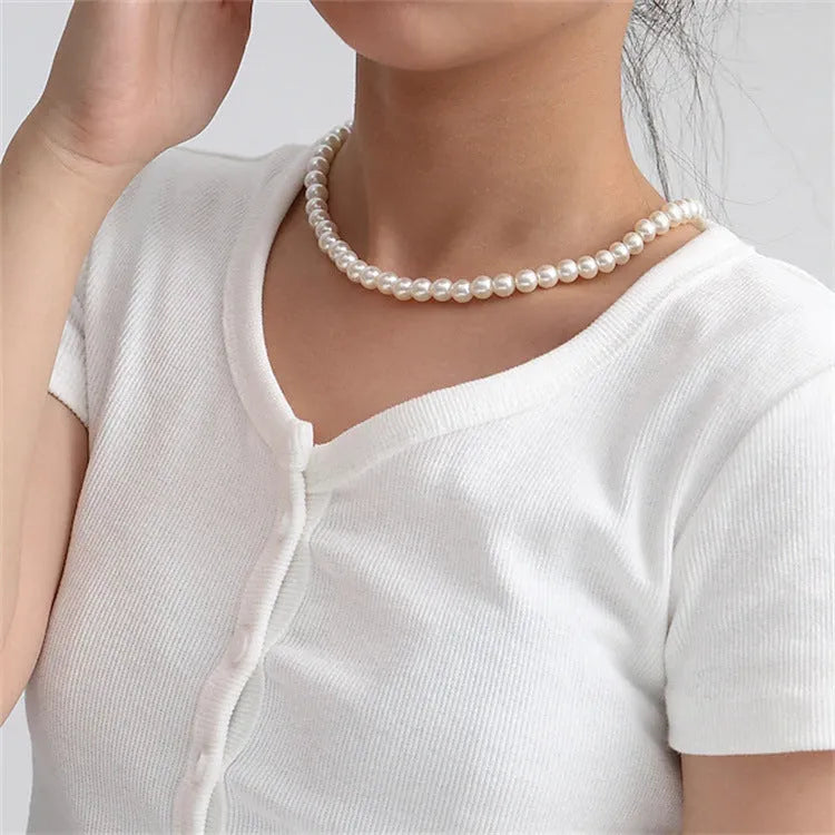 White round alloy pendant necklace for women on a simple background