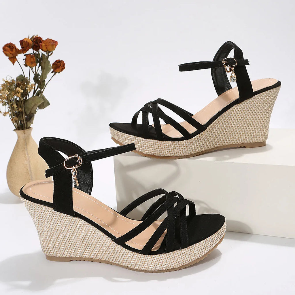 Women's black wedge sandals with fabric uppers and fish mouth toe design