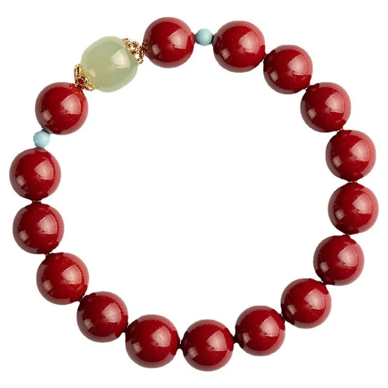 Purple gold sand cinnabar and Hetian jade geometric ellipse bead unisex bracelet on a wrist.