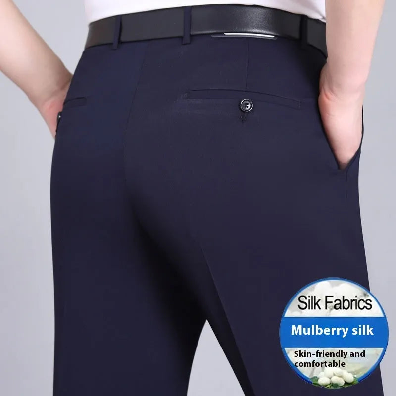 Men's straight leg formal trousers in a dark blue colour, showcasing the high waist and non-iron fabric blend.
