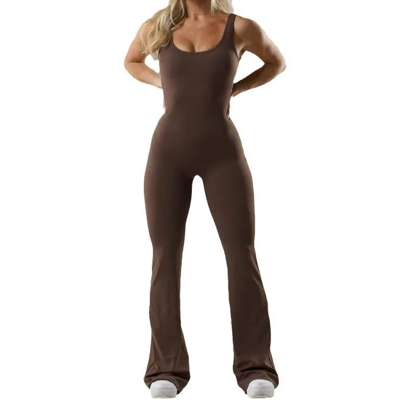 Black women's tight seamless yoga bodysuit with a mid waist and trousers length.