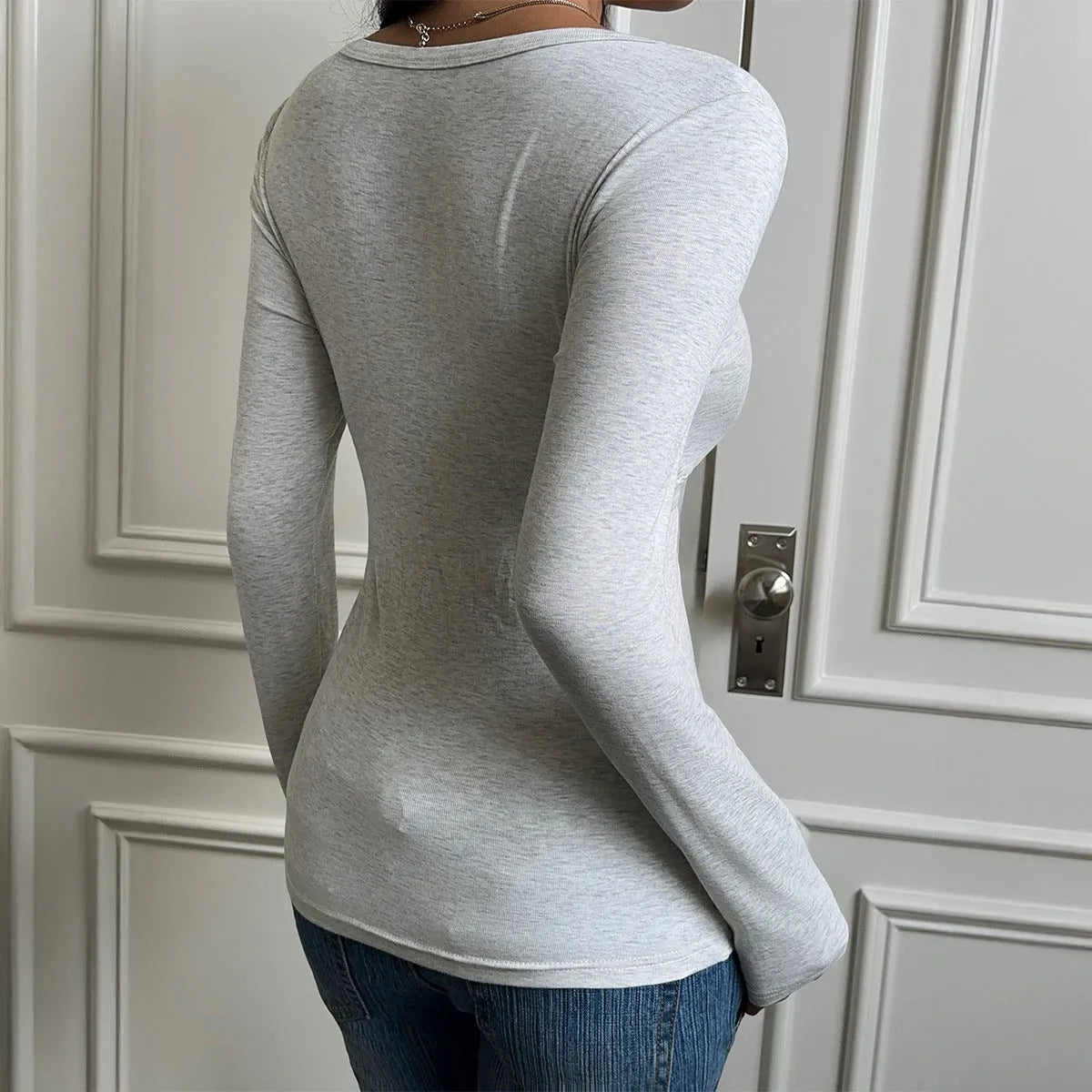 Women's slim fit long sleeve base layer t-shirt in gray sweater knit fabric