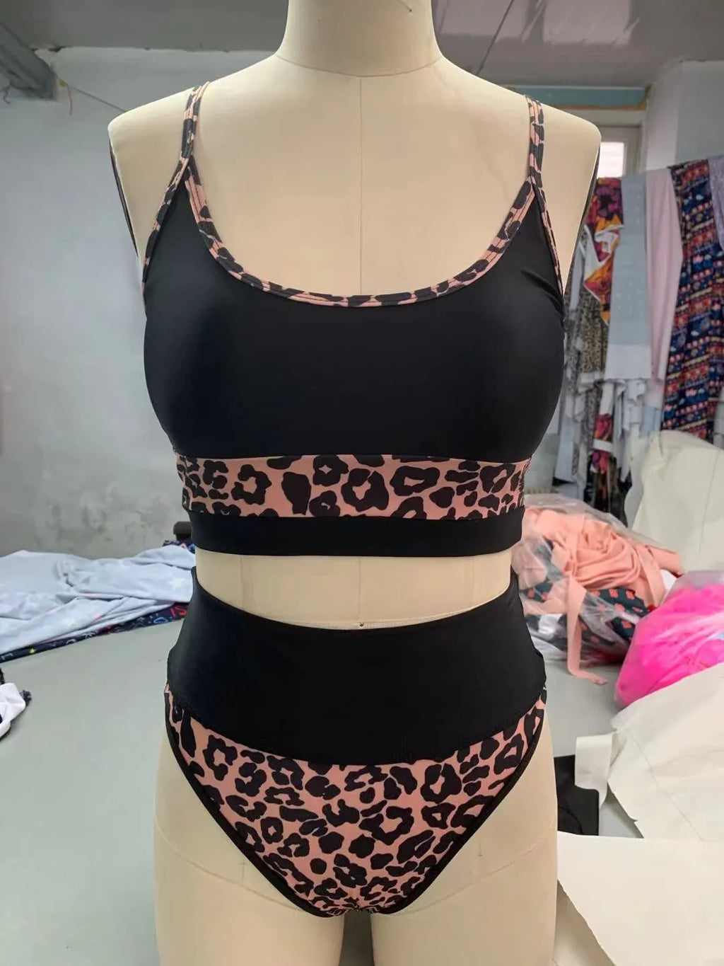 Women's high waist split bikini swimsuit in nylon fabric showing white and leopard print colour options