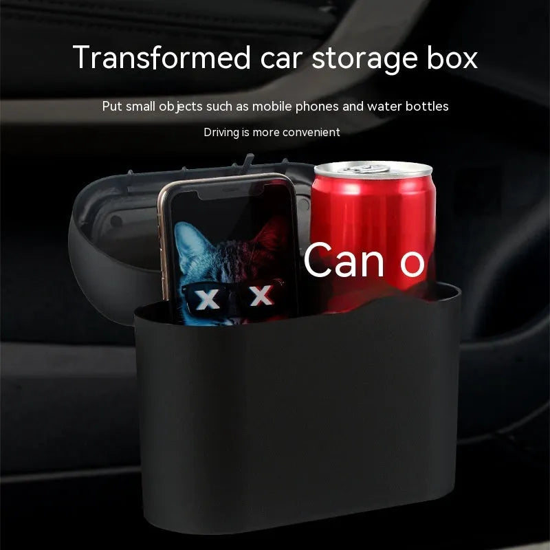 Folding car trash can in black waterproof plastic on car seat for waste collection