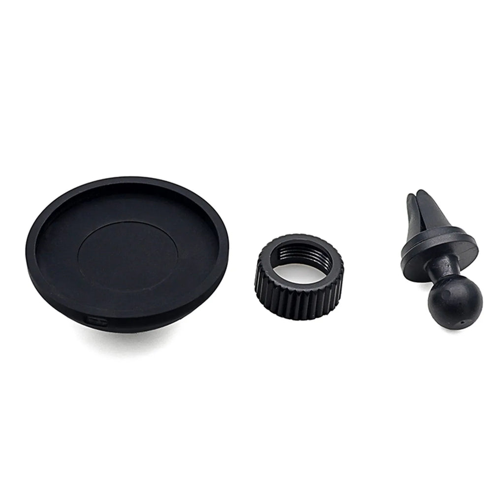 Black magnetic car phone holder mounted on vehicle air vent with smartphone attached