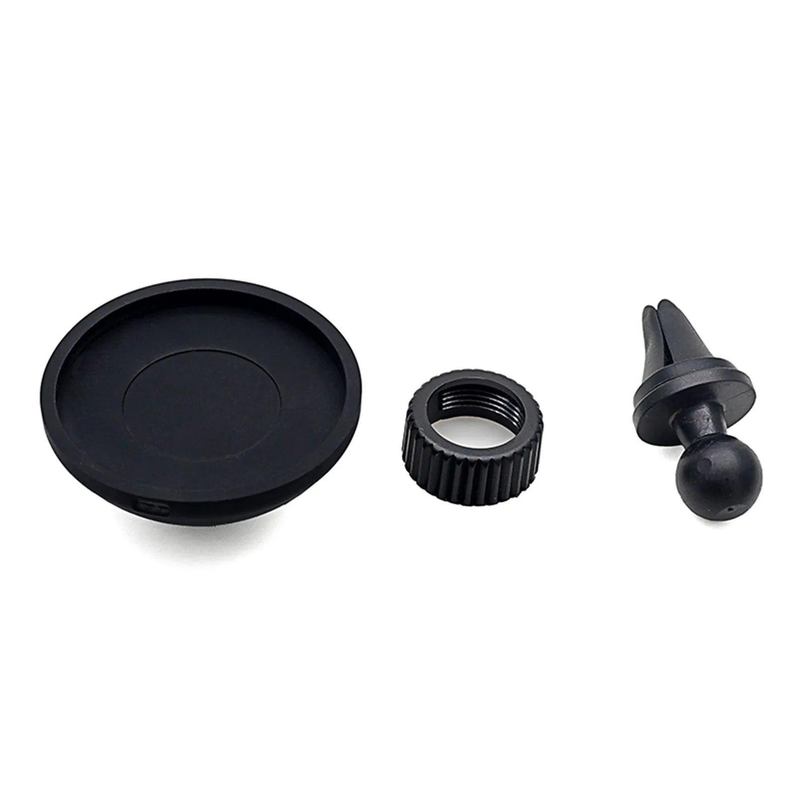 Black magnetic car phone holder mounted on vehicle air vent with smartphone attached