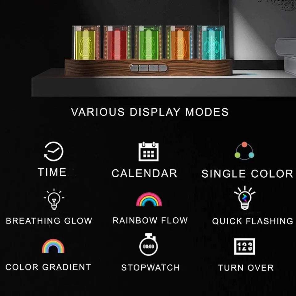 RGB LED digital clock showing colour-changing display on desk with black plastic casing