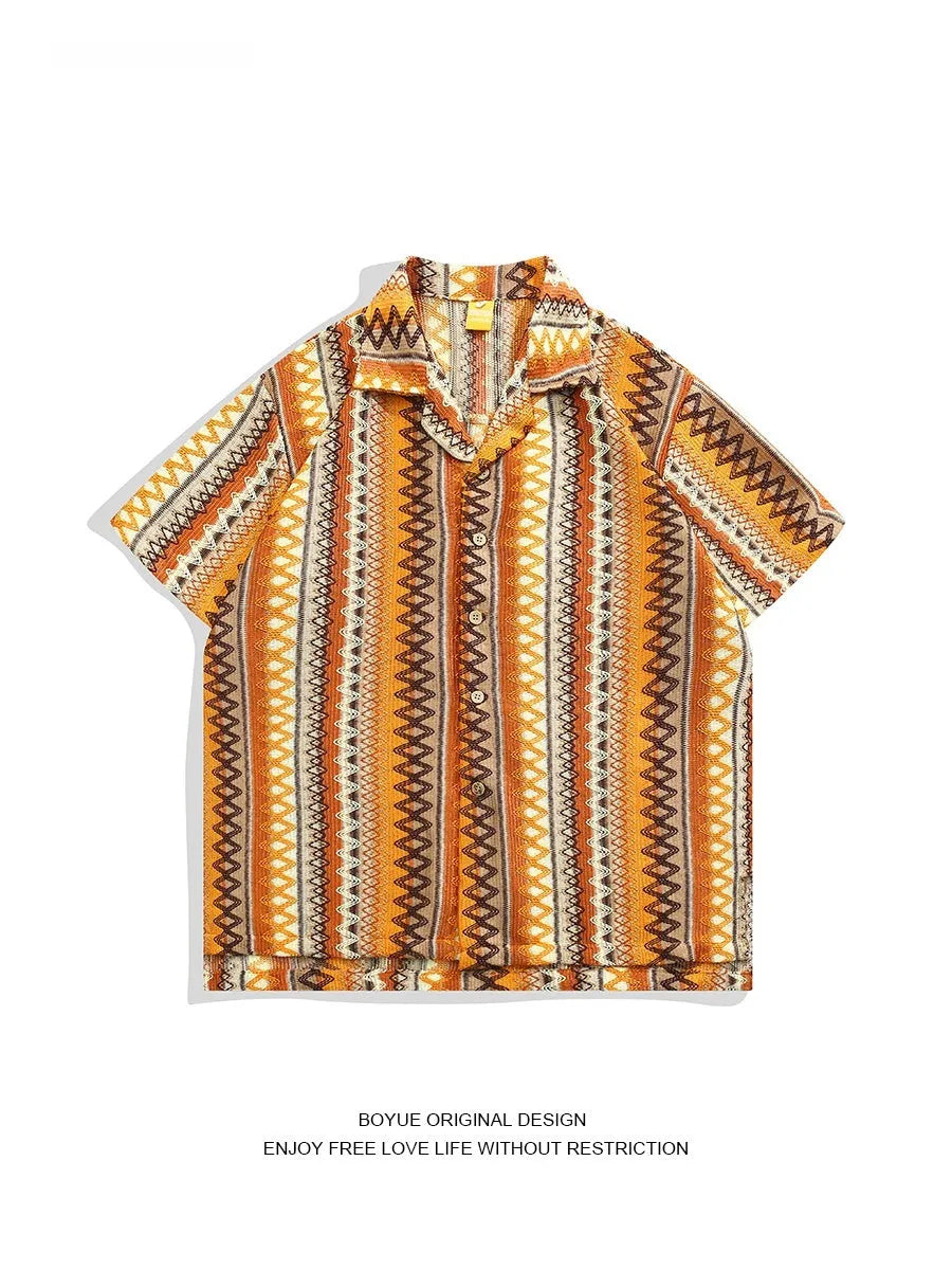 Ethnic style woven shirt with Cuban collar and contrast colours, shown in a loose fit with short sleeves.