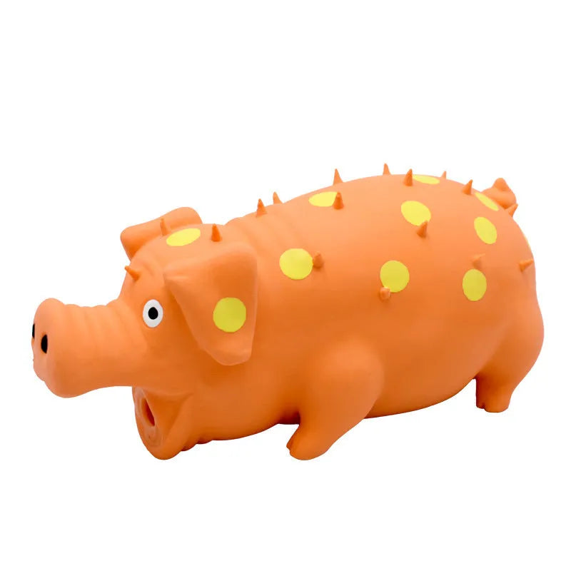 Pig-shaped latex squeaky dog chew toy in various colours with textured surface