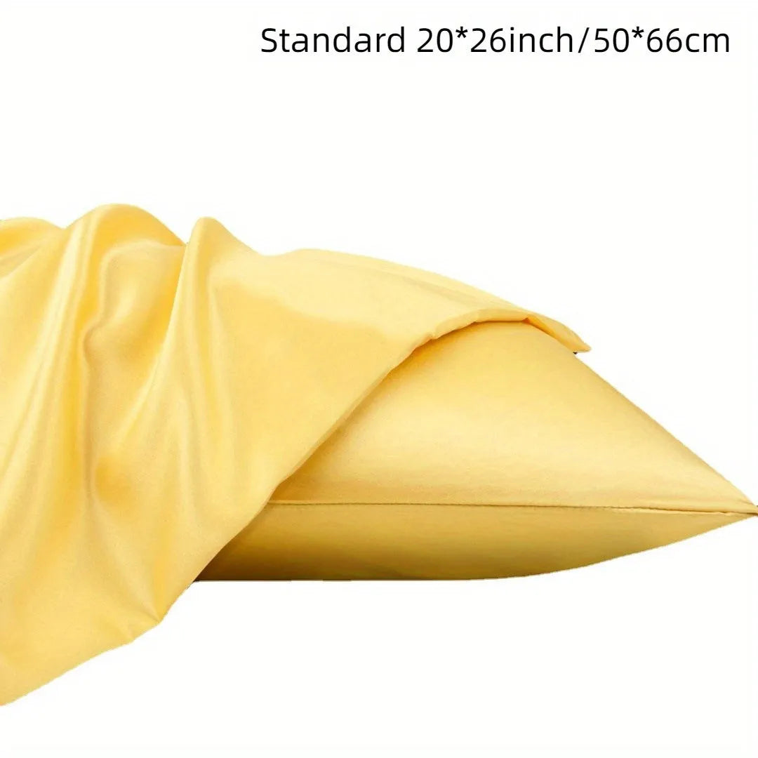 Pair of solid colour satin cloth pillowcases showing colour options including navy blue, wine red and light pink