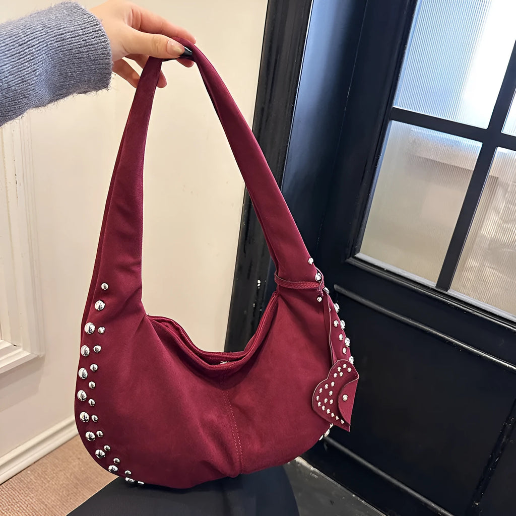 Strapless soft plush underarm tote handbag in a retro style, shown in one of its colour options.