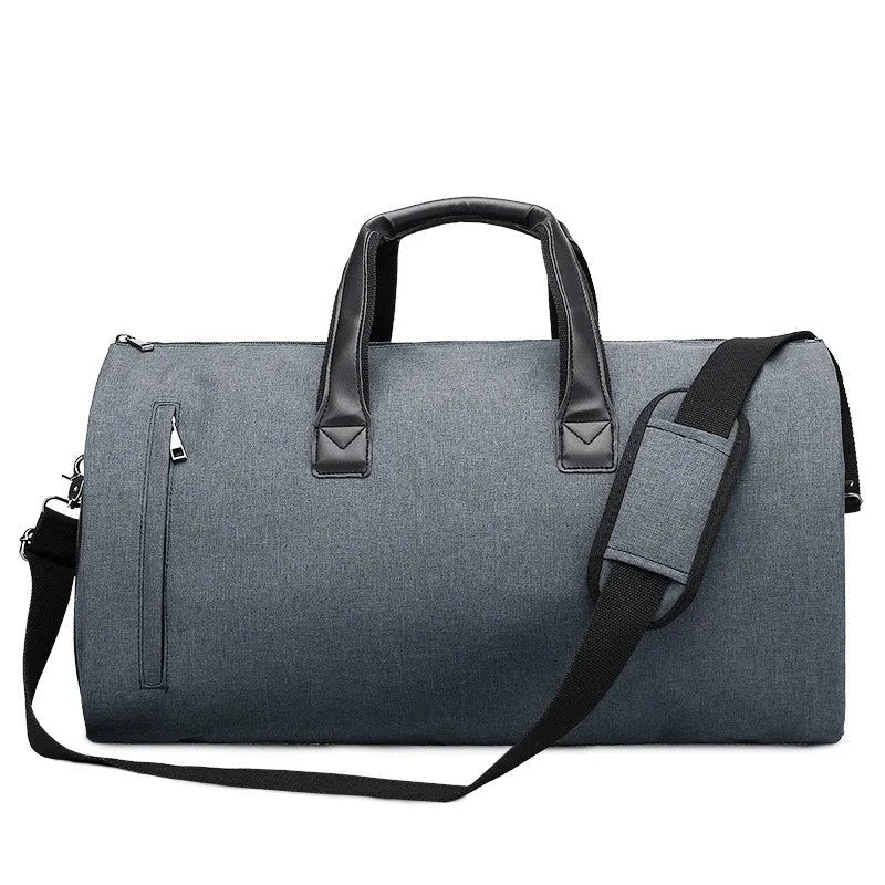 Medium oval travel bag in light grey oxford cloth, open to show internal organiser bags including camera insert and document pockets.