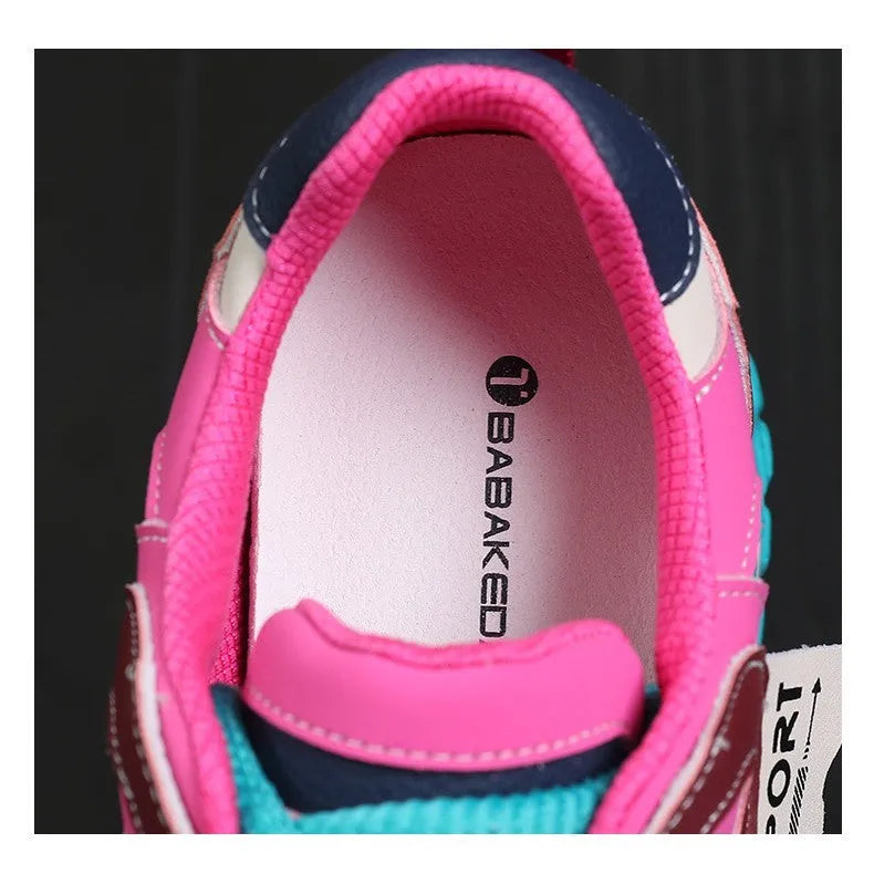 A pair of thick-soled leather casual shoes with a wedge heel and front lace-up design.