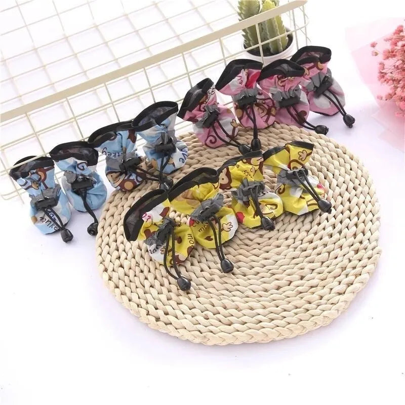 Four seasons breathable cloth dog shoes in multiple colours including fleece-lined red and monkey designs