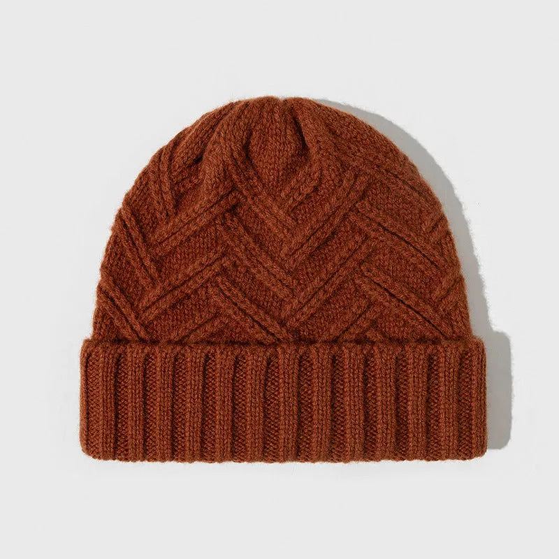 Wool knitted women's hat with dome crown in ankela red colour showing knitted texture