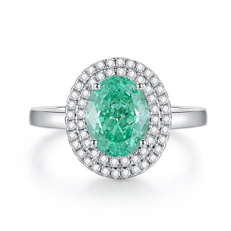 S925 sterling silver ring for women with a green emerald stone set using Palaibahao inlay and diamond accents.