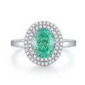S925 sterling silver ring for women with a green emerald stone set using Palaibahao inlay and diamond accents.