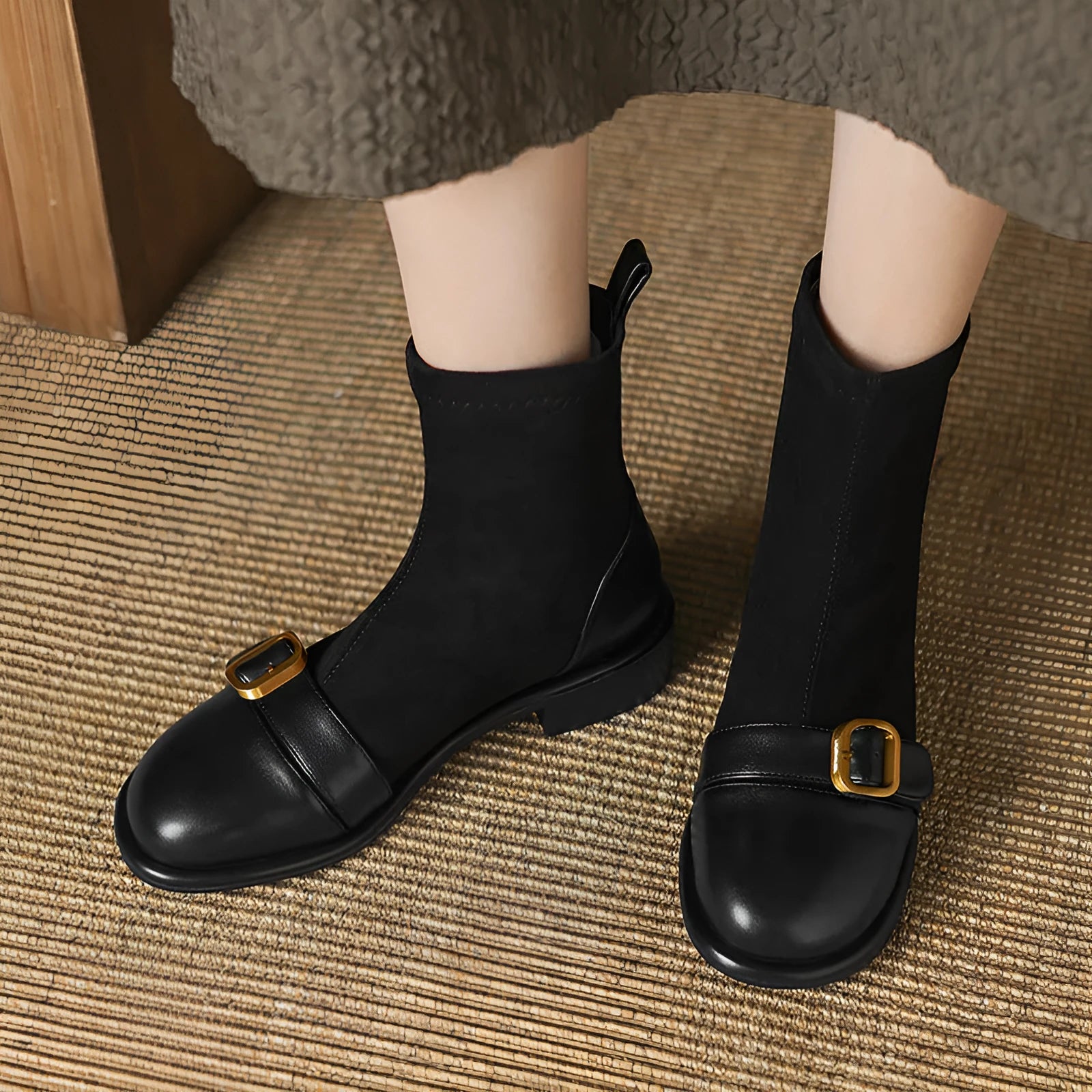 Women's black low heel Martin boots with belt buckle stitching and front lace-up design