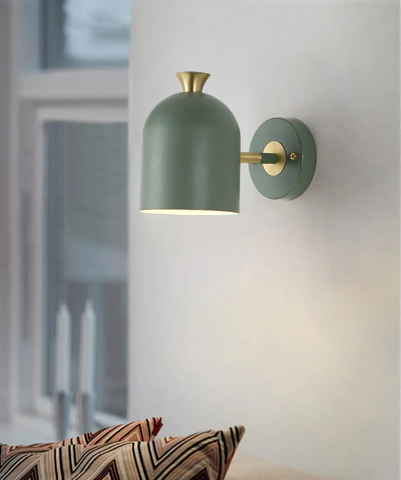 Single-head aluminium wall lamp with mirror front in choice of blue, green, pink or yellow LED light.