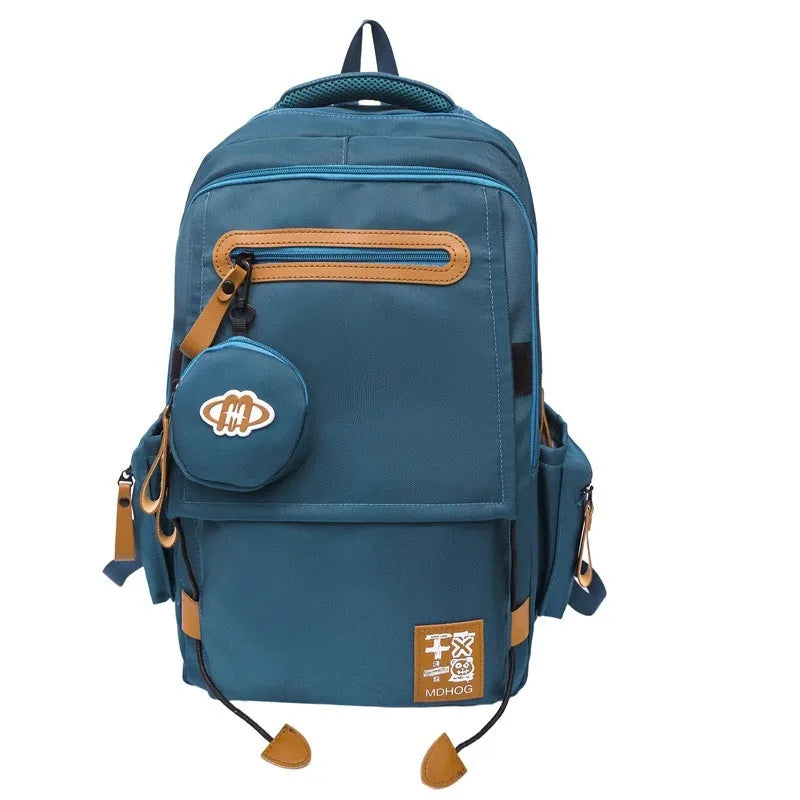 Japanese large capacity leisure travel backpack in khaki with contrast stitching and nylon waterproof finish