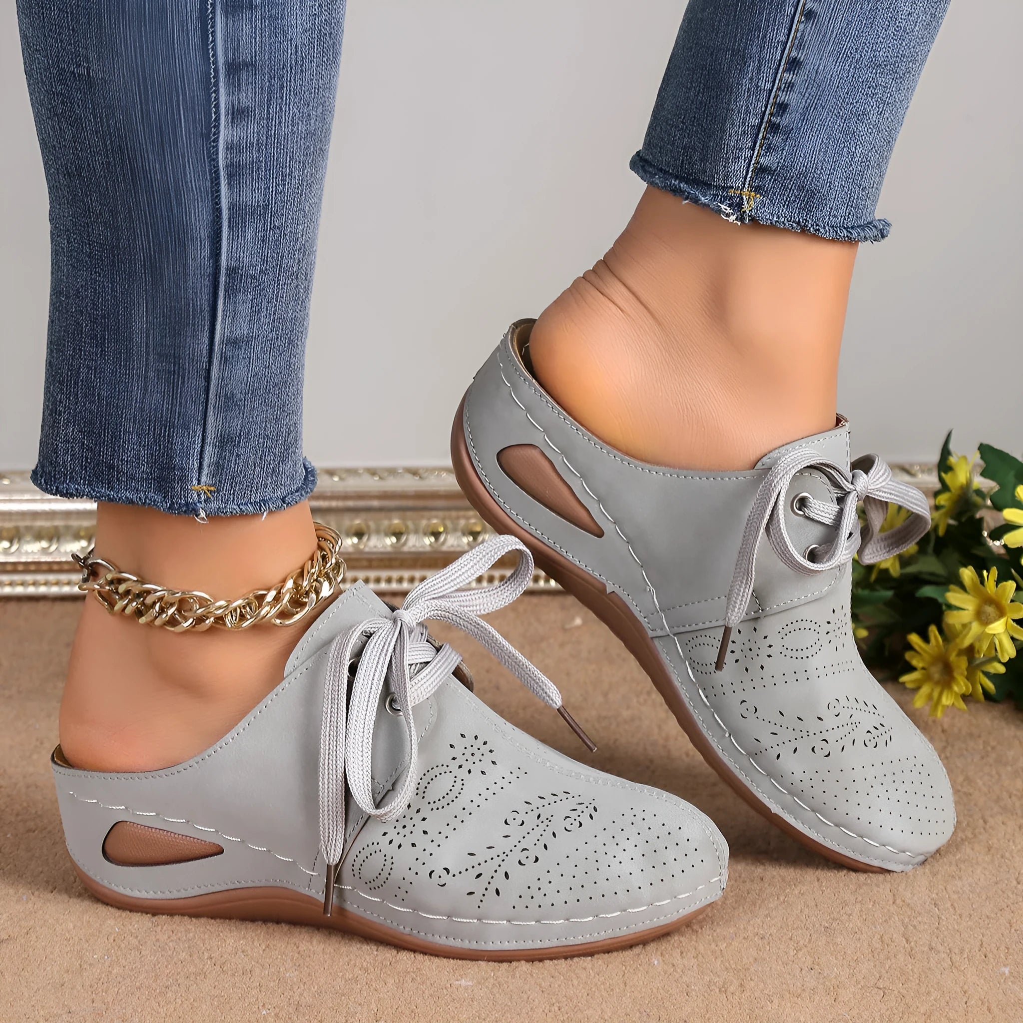 Women's lace-up Baotou slippers with hollow-out wedge design in suede material, available in multiple colours.
