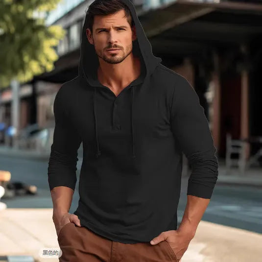 Men's dark blue cotton pullover hoodie with long sleeves on a hanger.