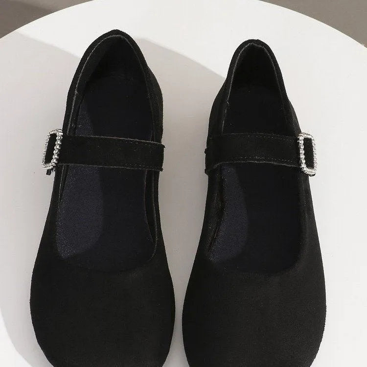 Solid black canvas fisherman shoes with low-top design and rubber sole