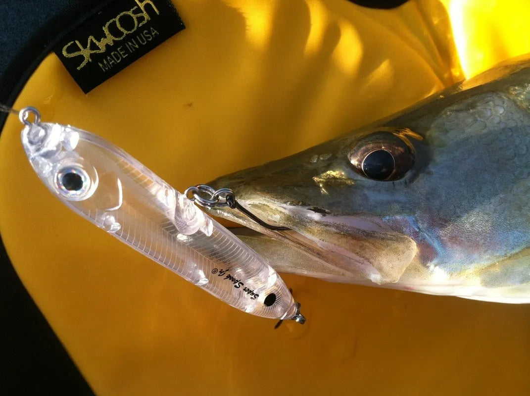 Transparent 9.5cm long ABS plastic blank fishing lure body with detailed shape and eye holes.