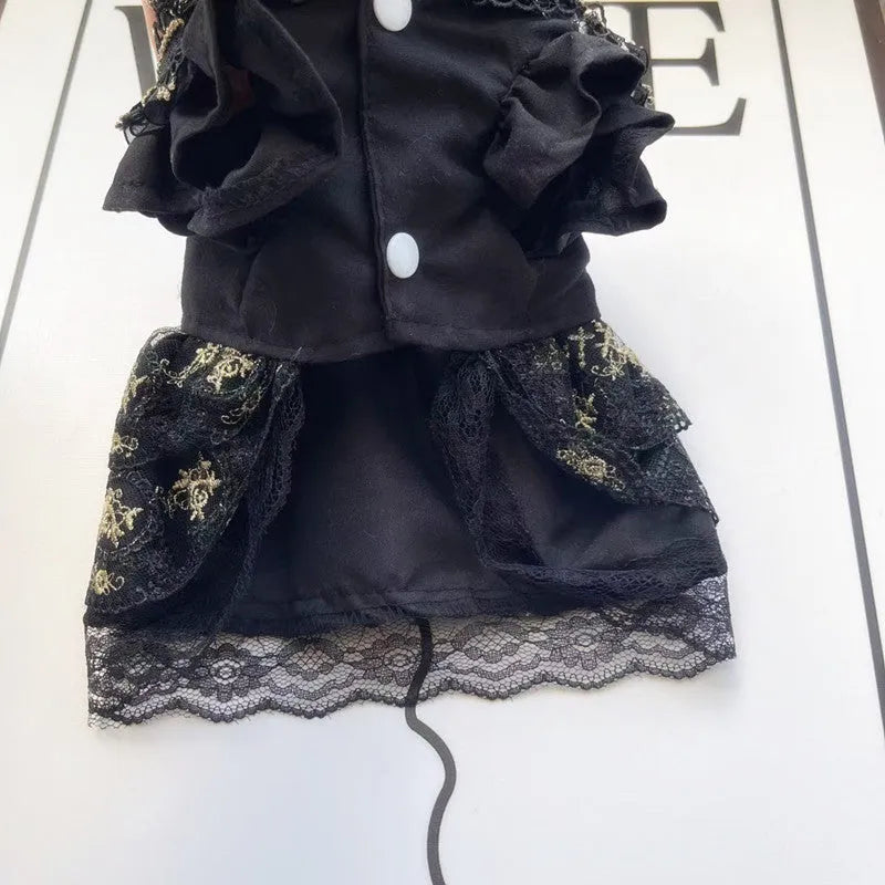 Golden polyester gothic princess style dress for a small dog on a mannequin.