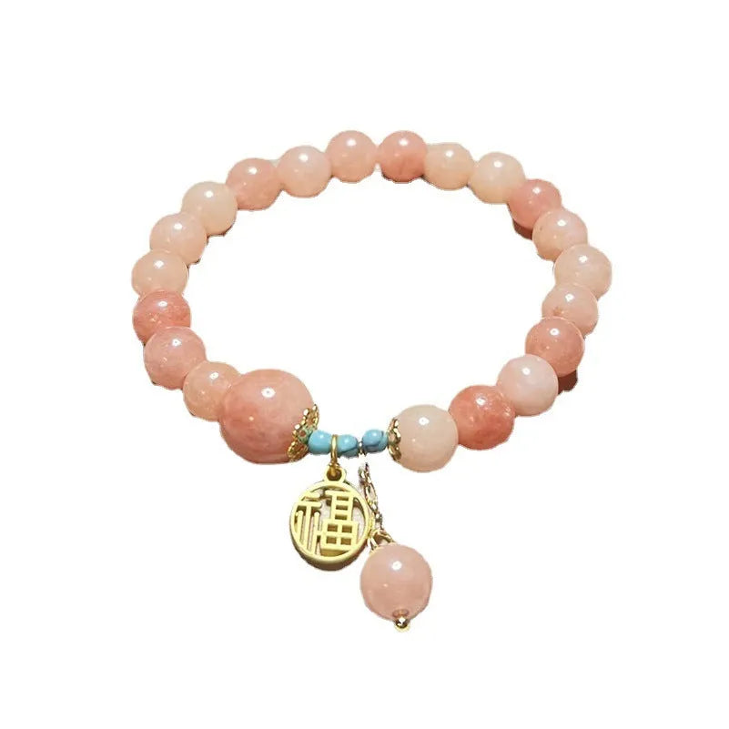 Fashion pink natural stone bracelet for women with alloy setting simple style on white background